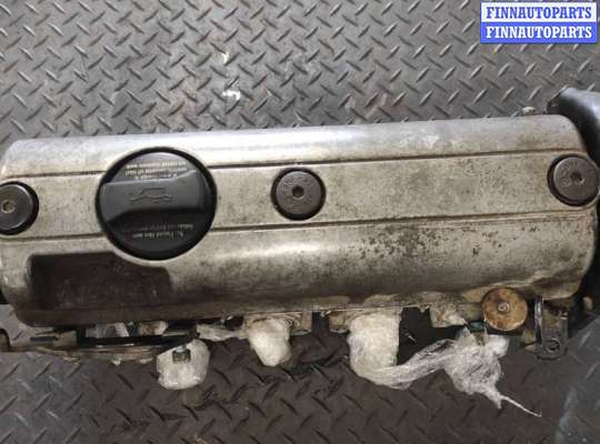 Головка блока цилиндров (ГБЦ в сборе) на Volkswagen Polo Mk3 (6N/6KV) 