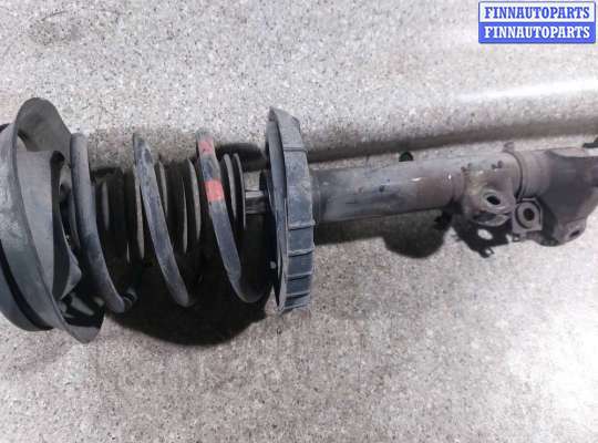 Стойка передняя левая MB1370670 на Mercedes C W203