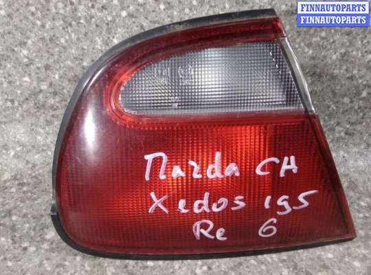 фонарь крышки багажника левый MZD3603 на MAZDA XEDOS 6