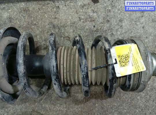 Стойка подвески амортизационная на Opel Zafira B