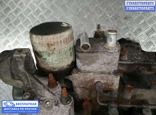 Корпус масляного фильтра на Ford Focus I