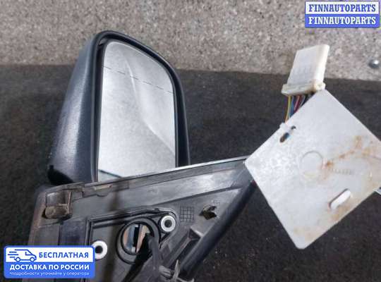 Зеркало боковое на Nissan Primera (P11)