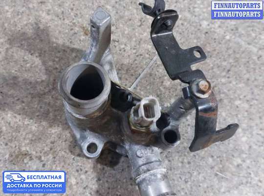 Фланец (тройник) системы охлаждения на Ford Focus II