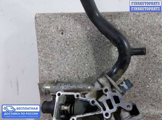 Корпус термостата на Peugeot 607