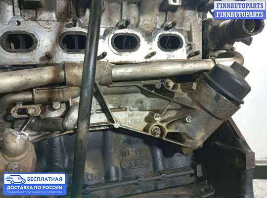 Корпус масляного фильтра на Opel Astra H / Classic