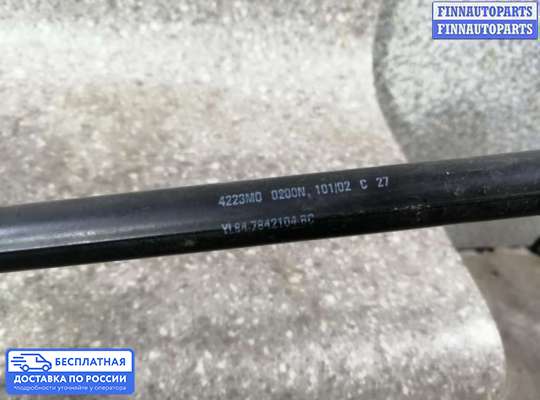 Амортизатор крышки багажника на Mazda Tribute I
