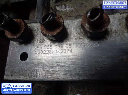 Блок ABS на Cadillac Escalade III (GMT 900)