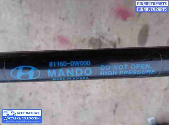 Амортизатор капота на Hyundai Santa Fe II (CM)