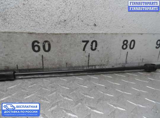 Амортизатор капота на Toyota Camry XV40