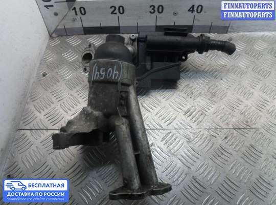 Корпус масляного фильтра на Audi Q7 (4L)