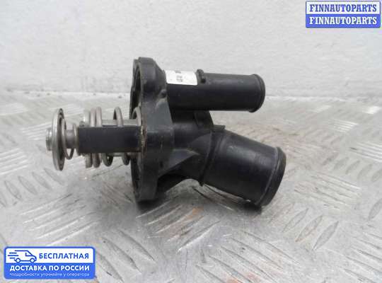 Корпус термостата на Ford Focus I