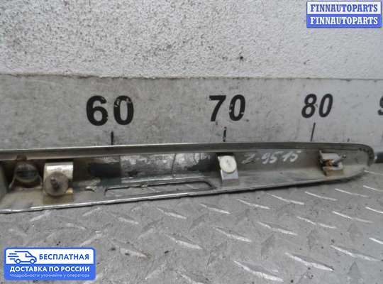 Планка подсветки номера на Toyota Camry XV30
