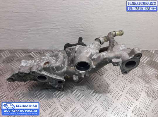 Корпус термостата на Mitsubishi L200 (KA, KB)