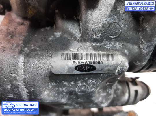 Корпус термостата на Mitsubishi L200 (KA, KB)