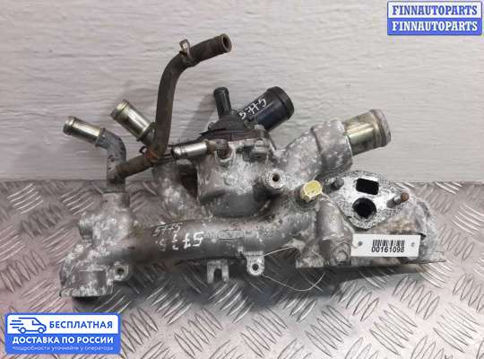 Корпус термостата на Mitsubishi L200 (KA, KB)