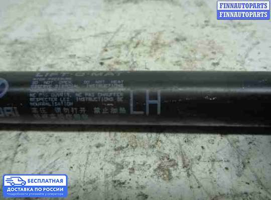 Амортизатор крышки багажника на Hyundai Santa Fe III (DM, NC)