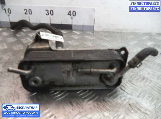 Радиатор масляный на Mercedes-Benz E (W210)