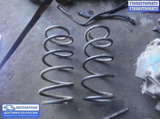 Пружина подвески на Opel Vectra B