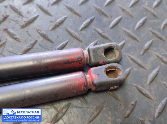 Амортизатор крышки багажника на Opel Vectra B