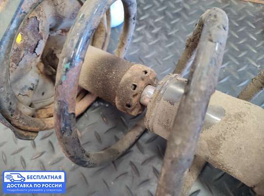 Пружина подвески на Mitsubishi Lancer IX