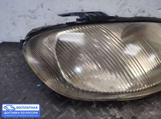 Фара передняя на Opel Omega B
