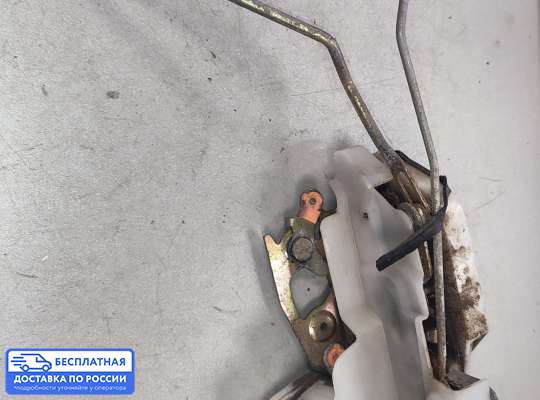 Замок боковой двери на Mitsubishi Lancer VI