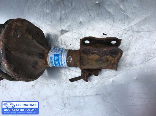 Пружина подвески на Mitsubishi Lancer IX