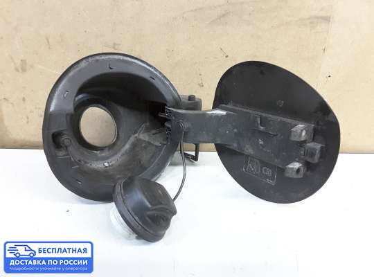 Лючок бензобака на Opel Astra J
