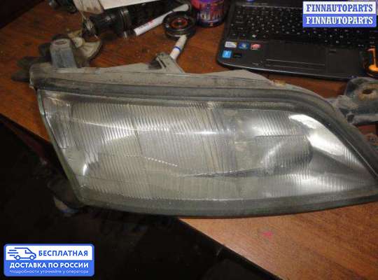 Фара передняя на Opel Vectra B