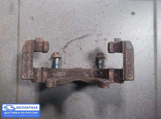 Скоба суппорта на Opel Corsa C