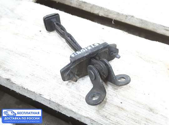 Ограничитель двери на Ford Mondeo I