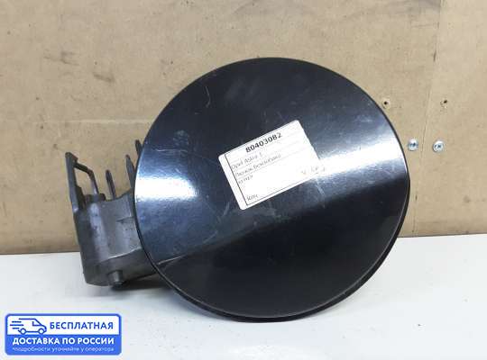Лючок бензобака на Opel Astra J