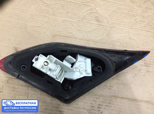 Фонарь крышки багажника на Opel Astra J