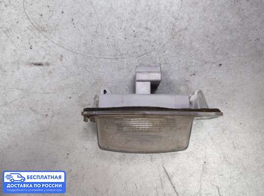 Планка подсветки номера на Mitsubishi Outlander II / XL (CW)
