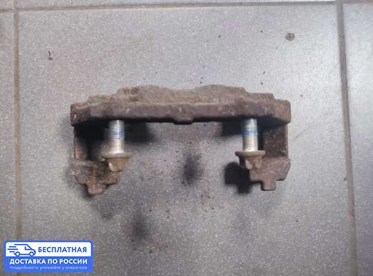 Скоба суппорта на Opel Corsa C