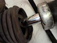 купить Амортизатор подвески на Nissan Teana II (J32)