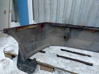 купить Бампер задний на Mitsubishi Lancer VI