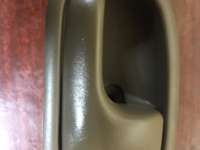 купить Ручка двери внутренняя на Mazda 323 (BA) 323C/ 323F/ 323S/ 323P